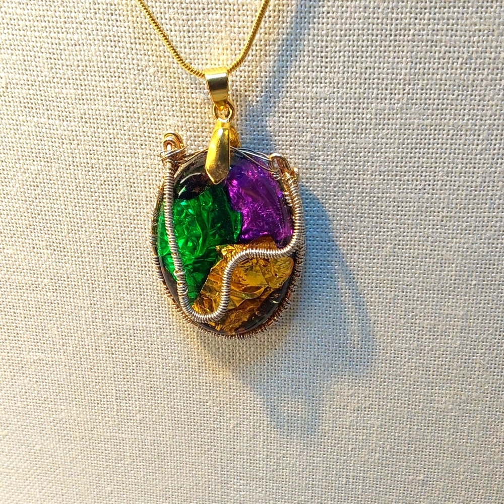 Necklace 18 inches long brass is brass.Silver wiring , an inch and a half